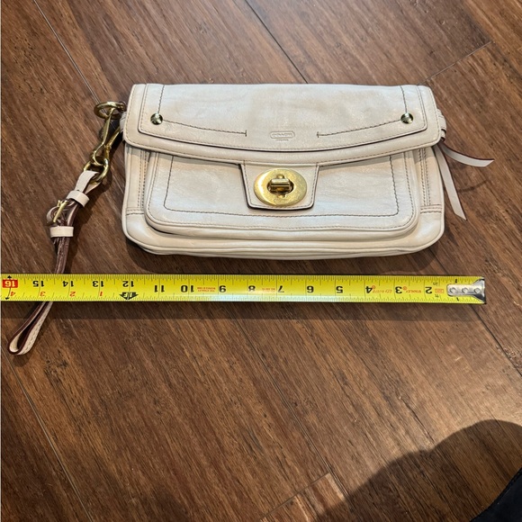 Coach Handbags - Coach Beige Leather Wristlet with Gold Hardware